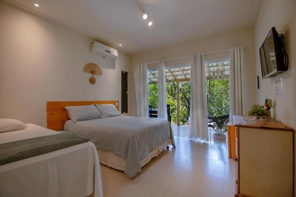 Aruana Suites Seu Refugio Entre Arvores A 5Km Da Vila De Praia Do Forte Bagian luar foto